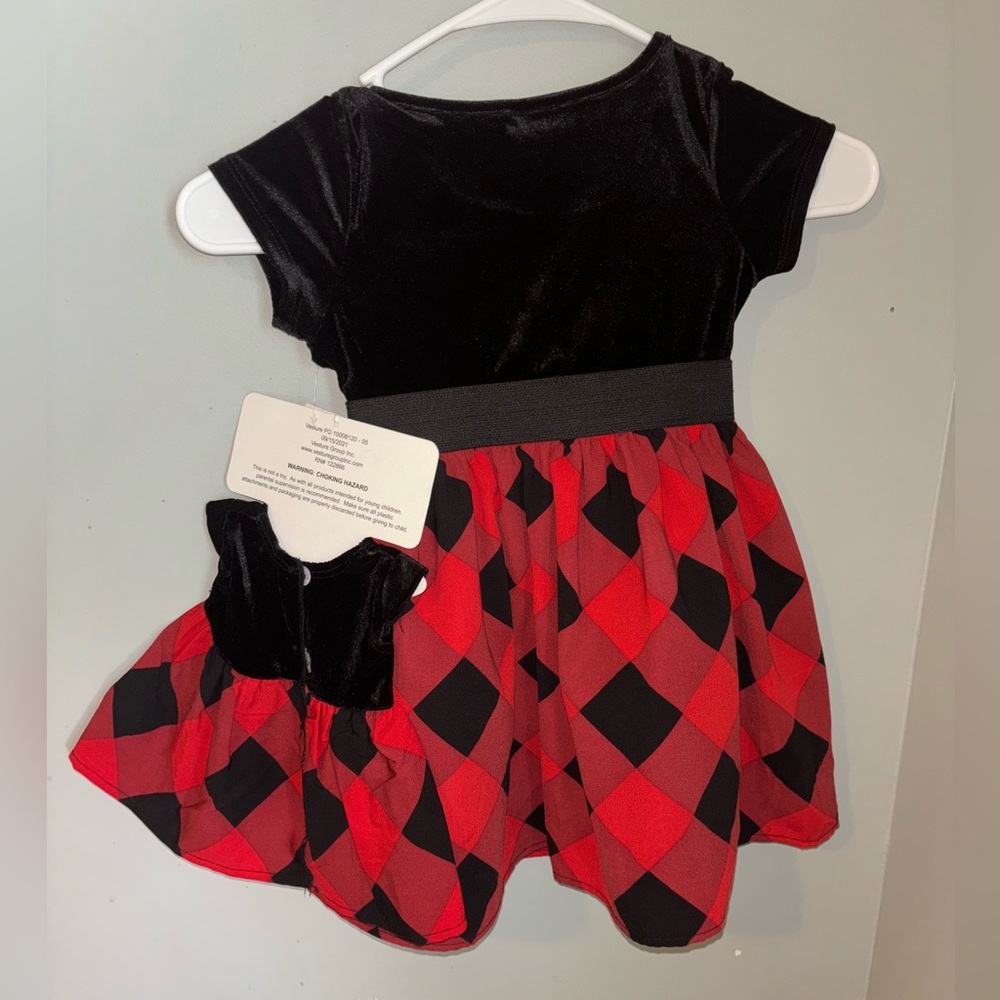 4T Red and Black checkered dress. Comes with matching dress for her favorite dol